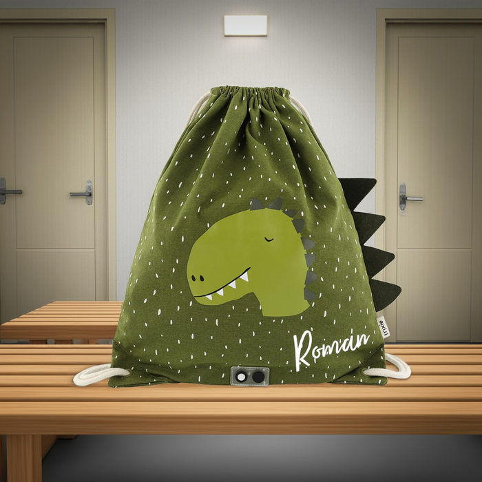 Trixie Sportbeutel Herr Dino für Kinder – wasserabweisender Turnbeutel mit Dinomotiv und zwei Zugbändern